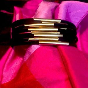 NWT Faux leather black cord and gold bracelet. 7” with 2” gold chain extender